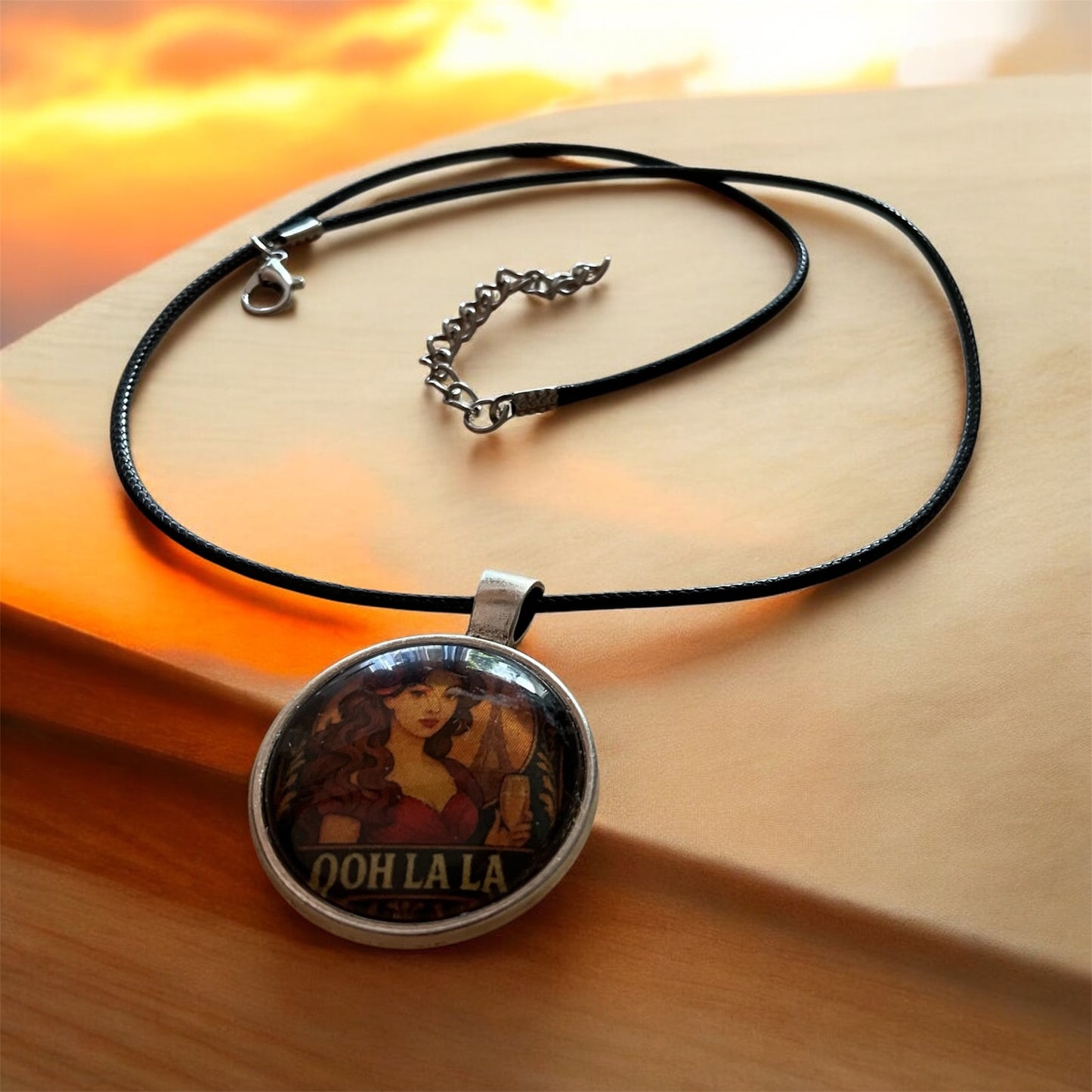 “Ooh La La” pendant with black cord necklace