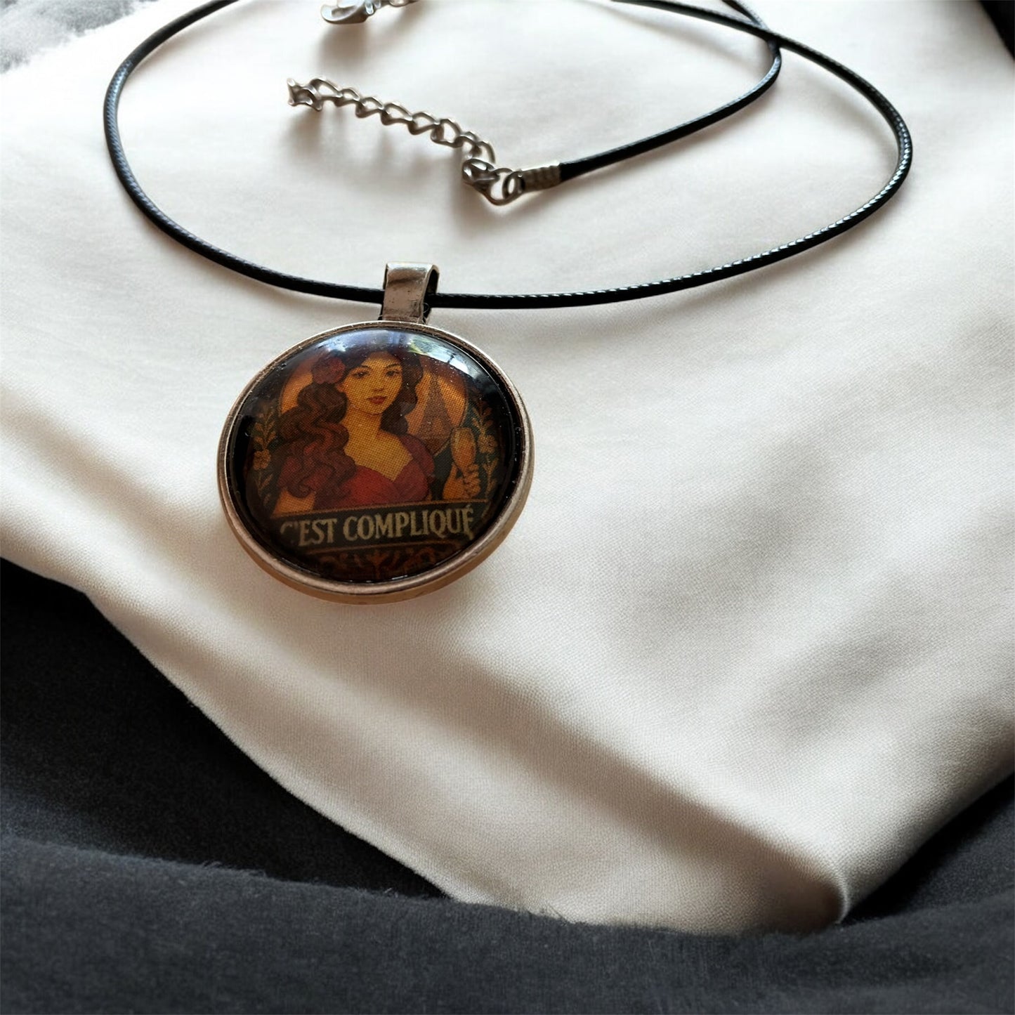 “C’est compliqué” retro pendant with black necklace