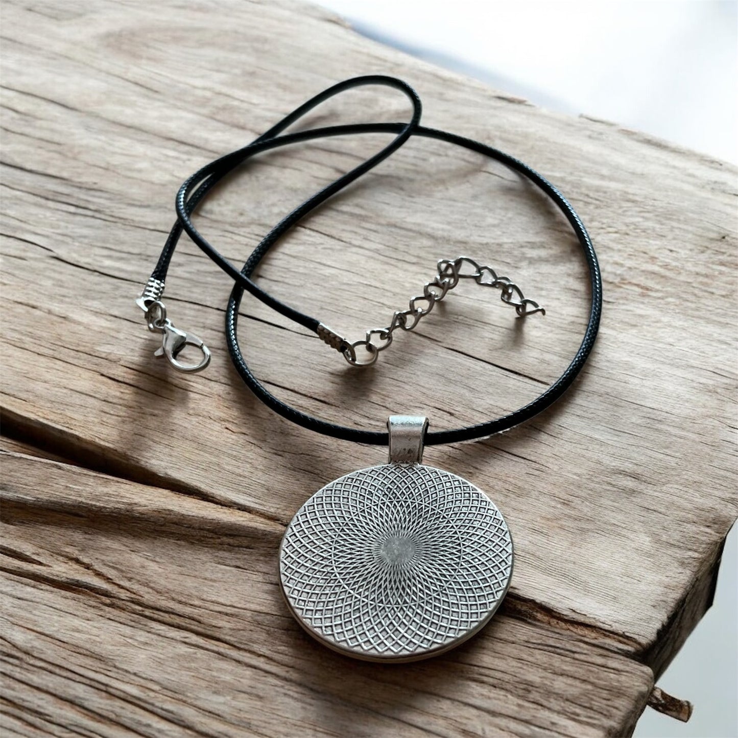 Sassy “Bordélique” pendant with black cord necklace