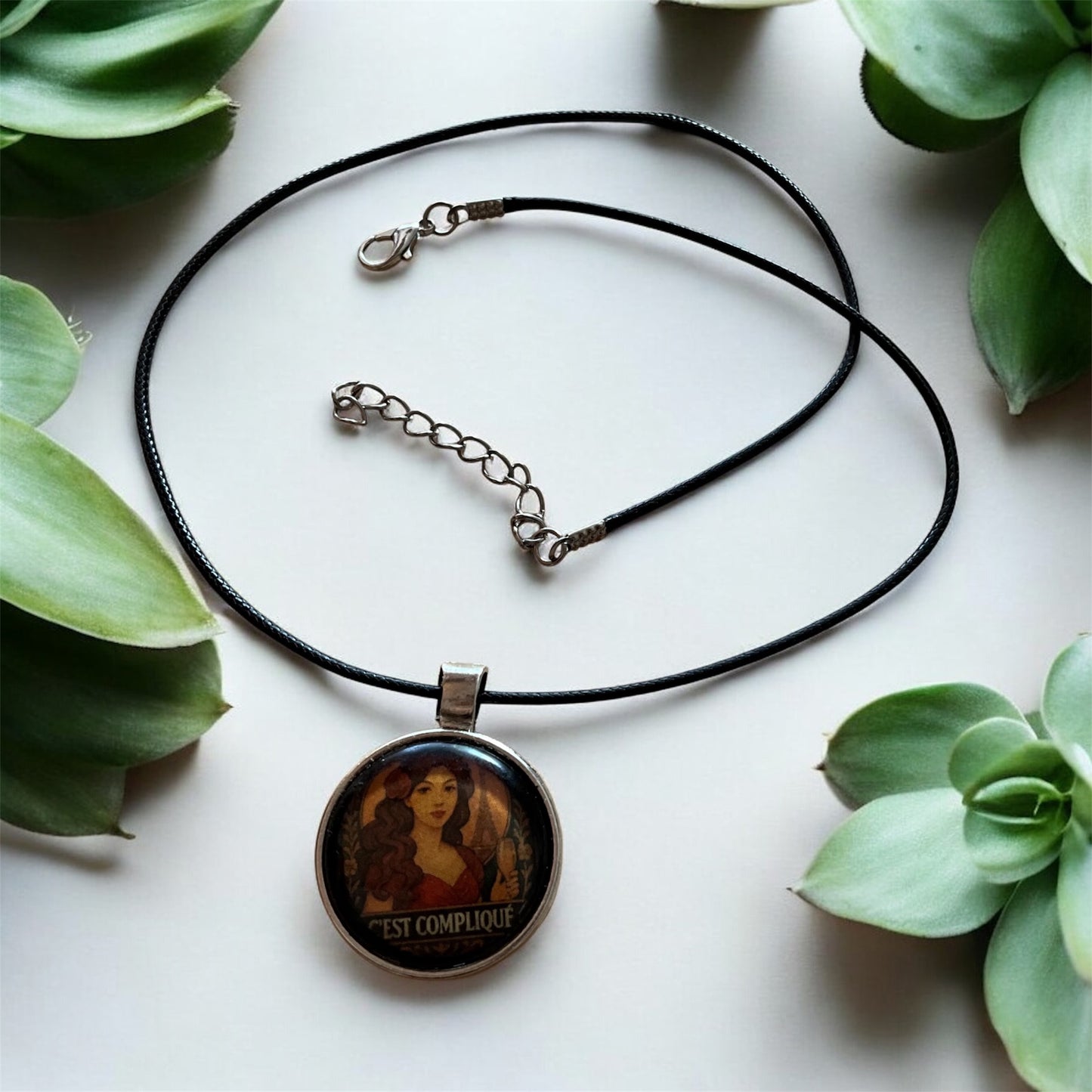 “C’est compliqué” retro pendant with black necklace