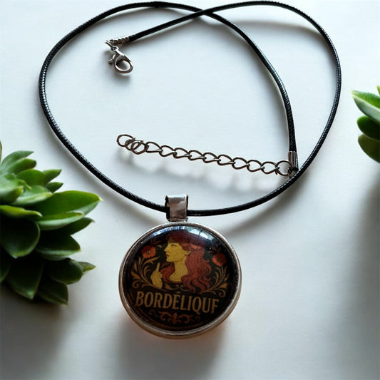 Sassy “Bordélique” pendant with black cord necklace