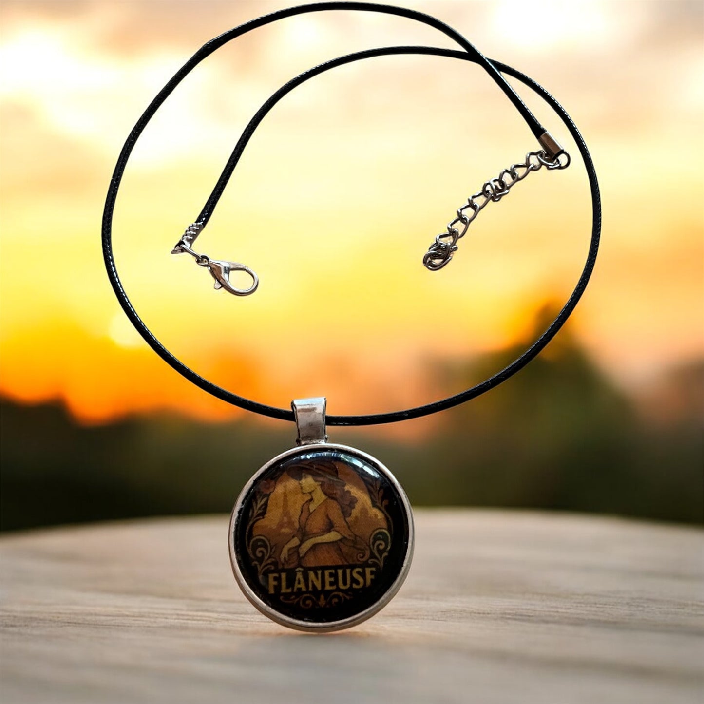 “Flâneuse” pendant with black cord necklace