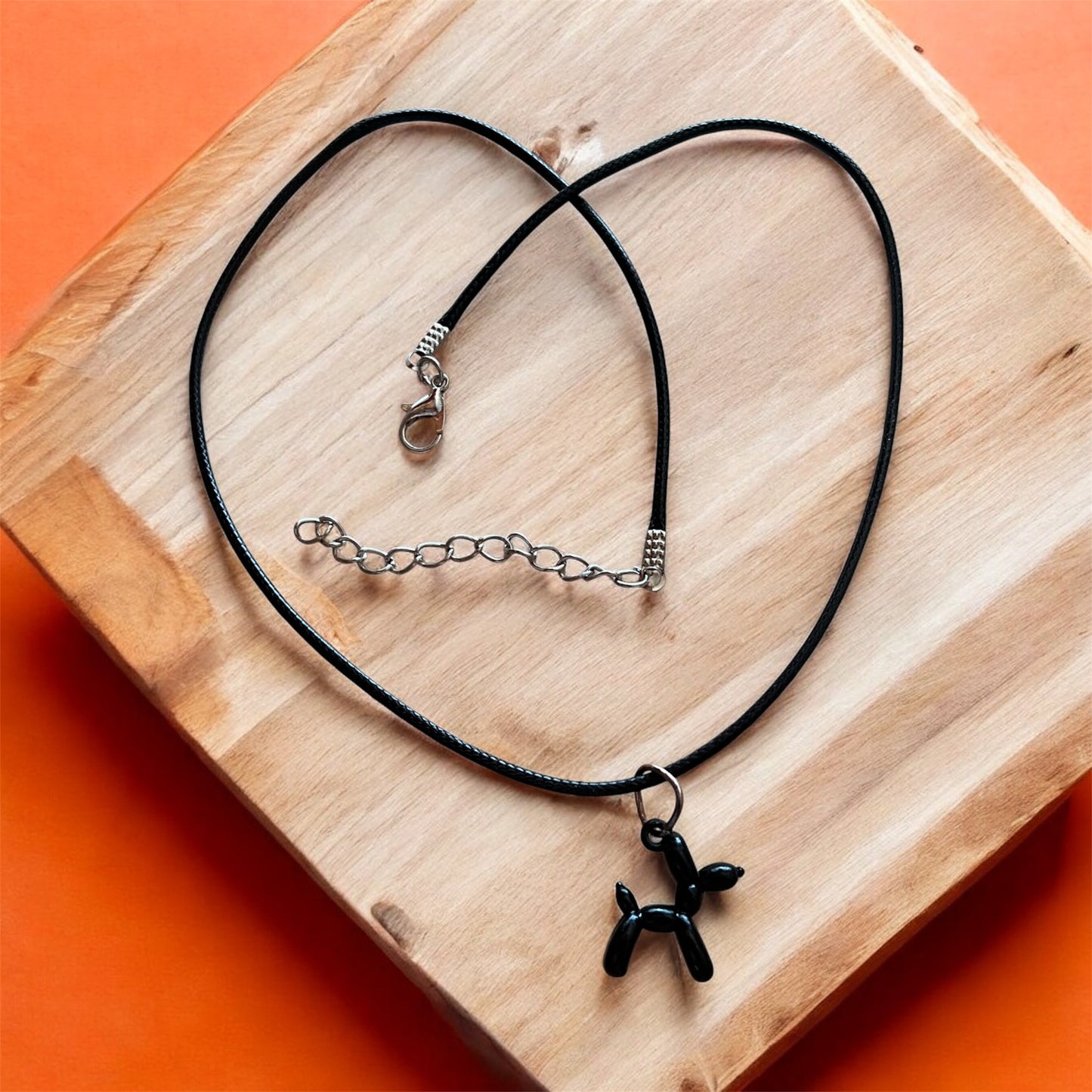 Baloon dog pendant with black cord necklace