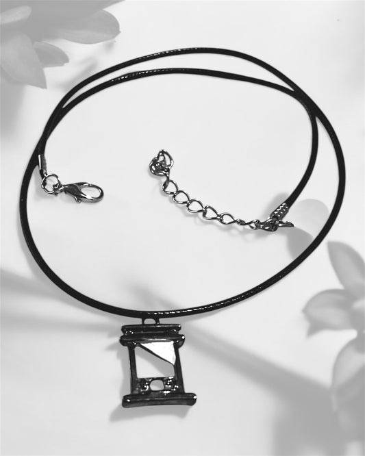 Guillotine pendant with black necklace