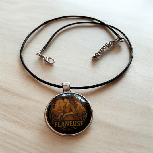“Flâneuse” pendant with black cord necklace