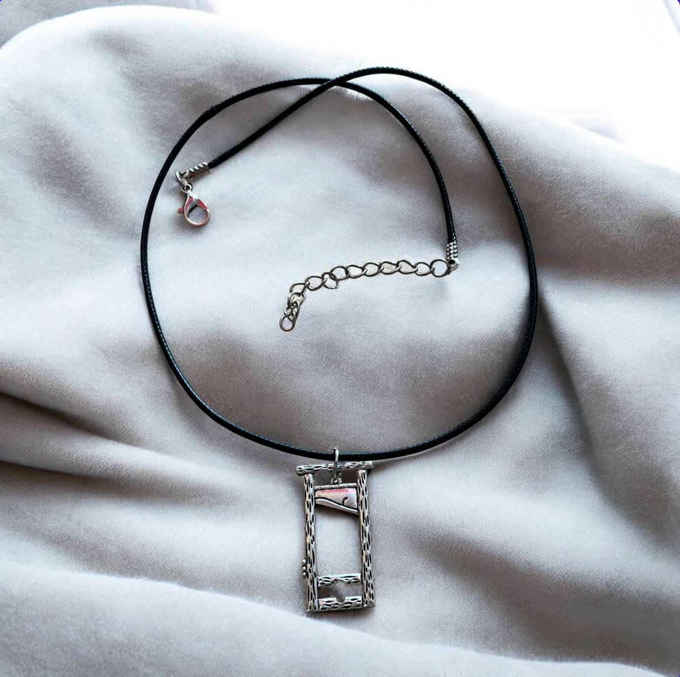 Silver plated guillotine pendant with black necklace